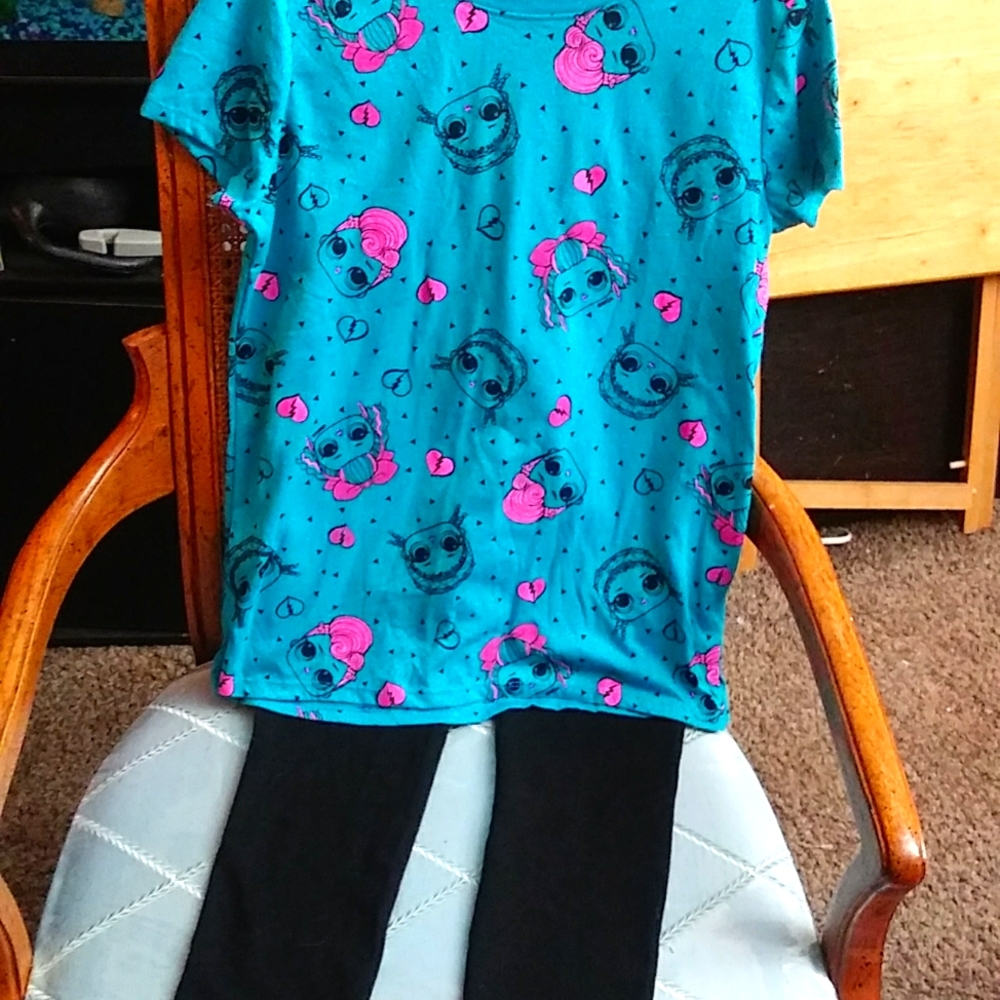 Two piece set shirt and pants are both 10-12. used